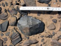 A biface (hand axe) in the Wadi Beiza Palaeolithic quarries. Photo: Per Storemyr